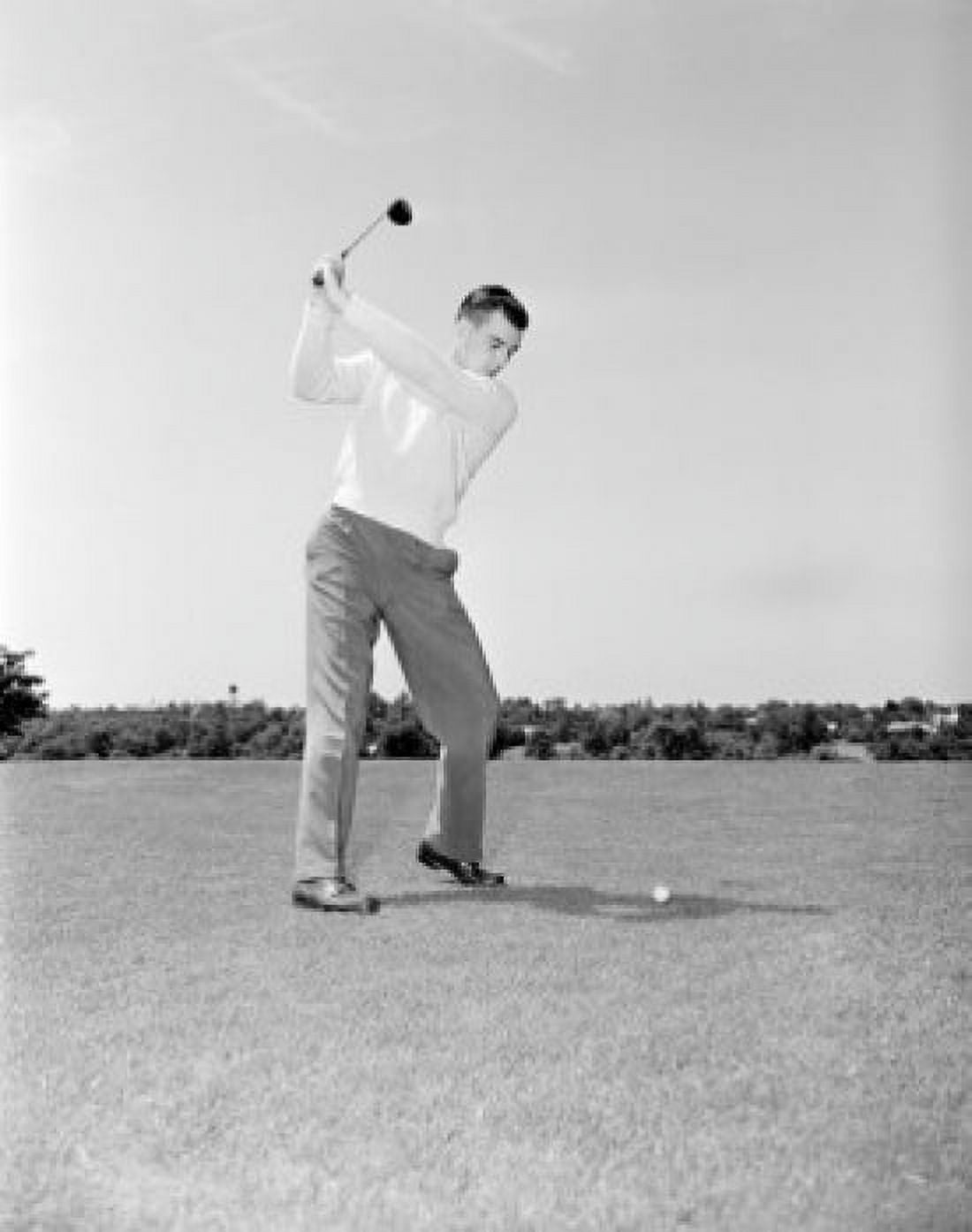 Young man playing golf Canvas Art - (18 x 24)