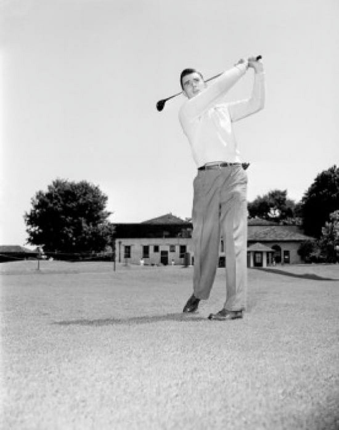 Young man playing golf Canvas Art - (18 x 24)