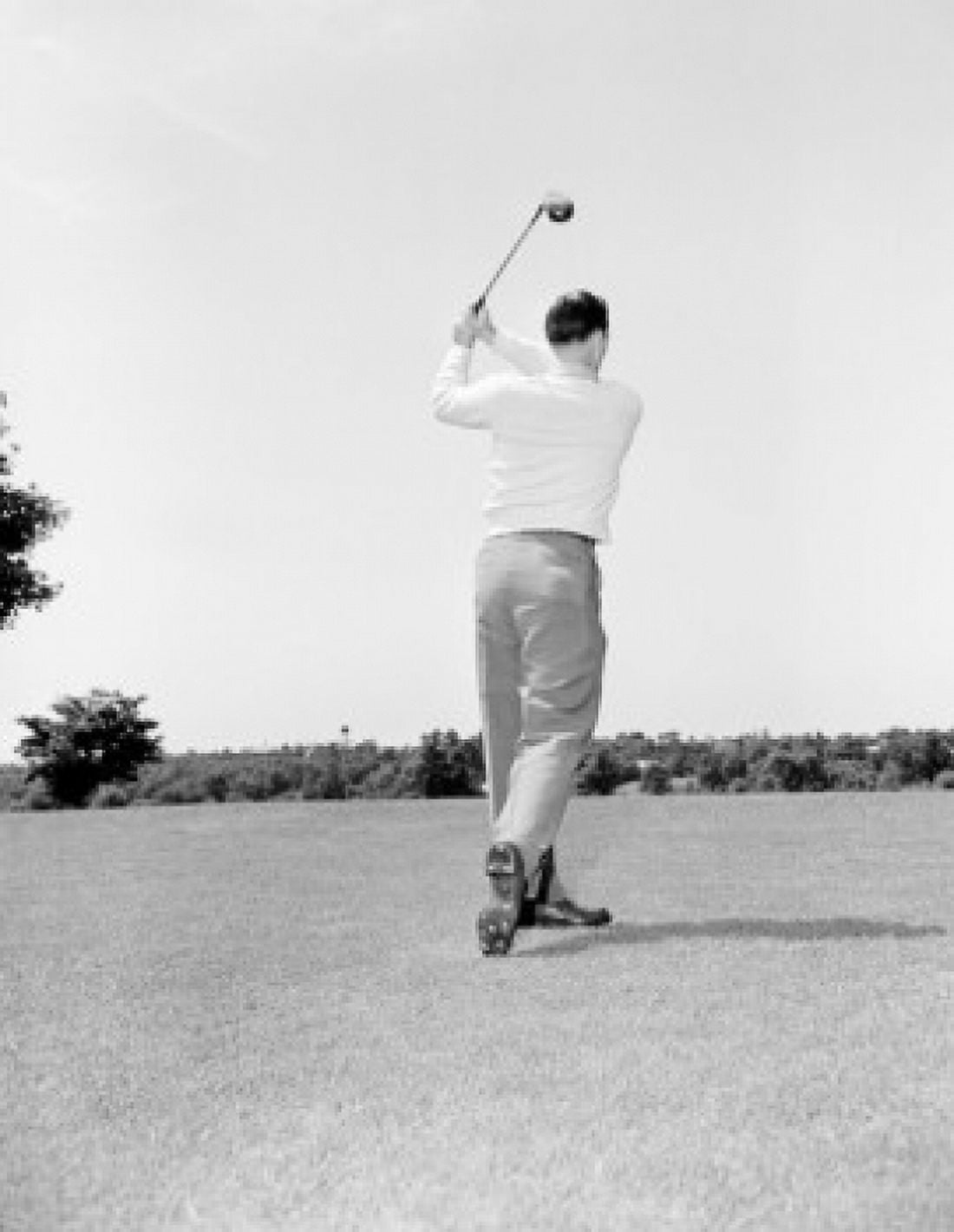 Young man playing golf Canvas Art - (18 x 24)