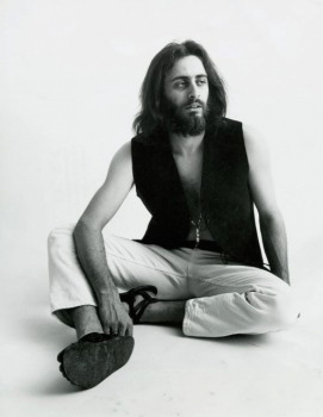 Young man sitting on the floor Canvas Art - (24 x 36)