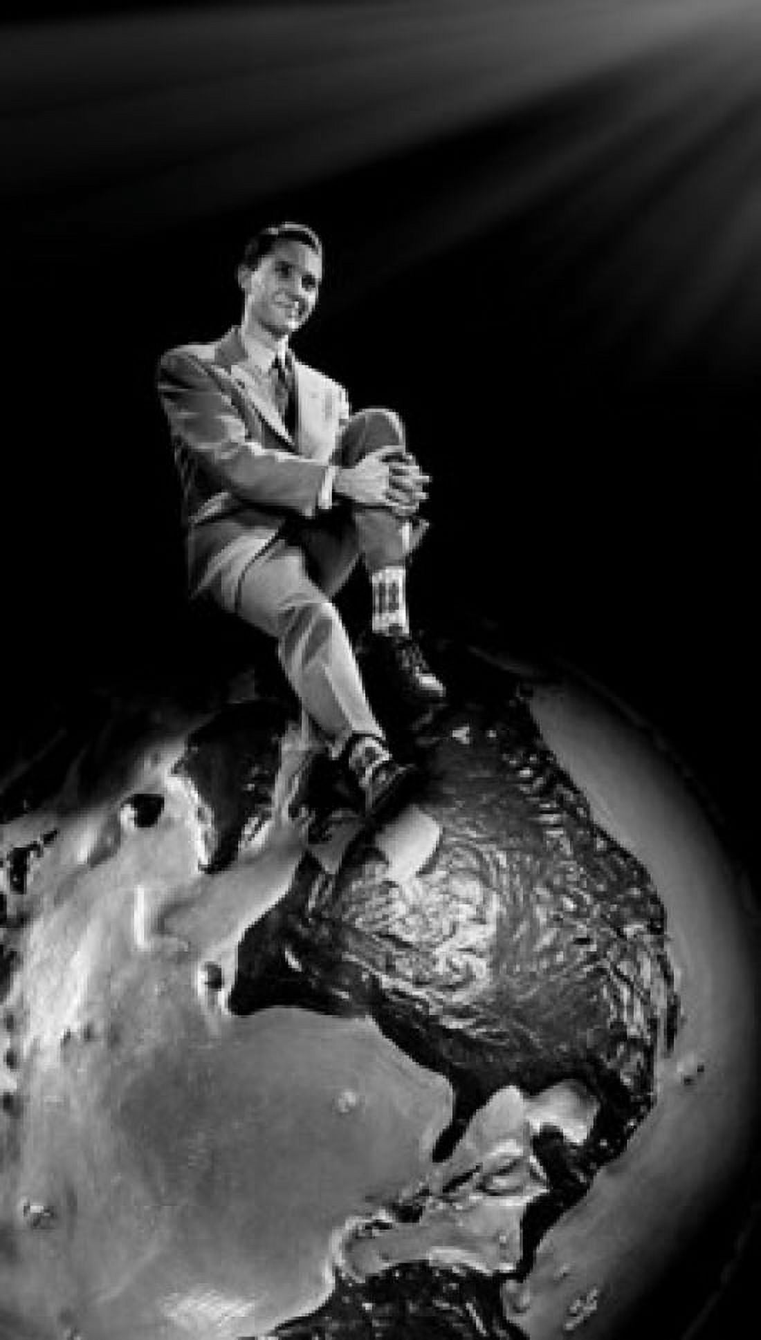 Young man sitting on top of globe Canvas Art -  (18 x 24)