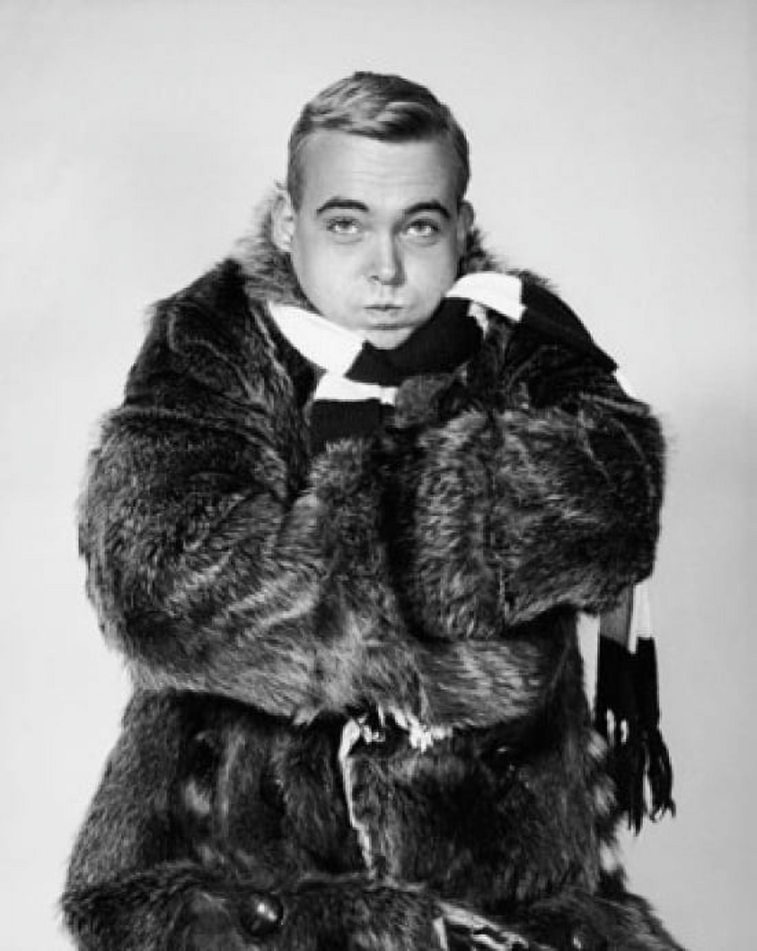 Young man wearing a raccoon coat and shivering Canvas Art - (24 x 36)