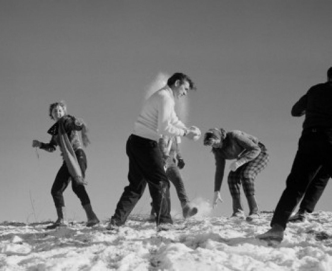 Young people playing with snow Canvas Art - (18 x 24)
