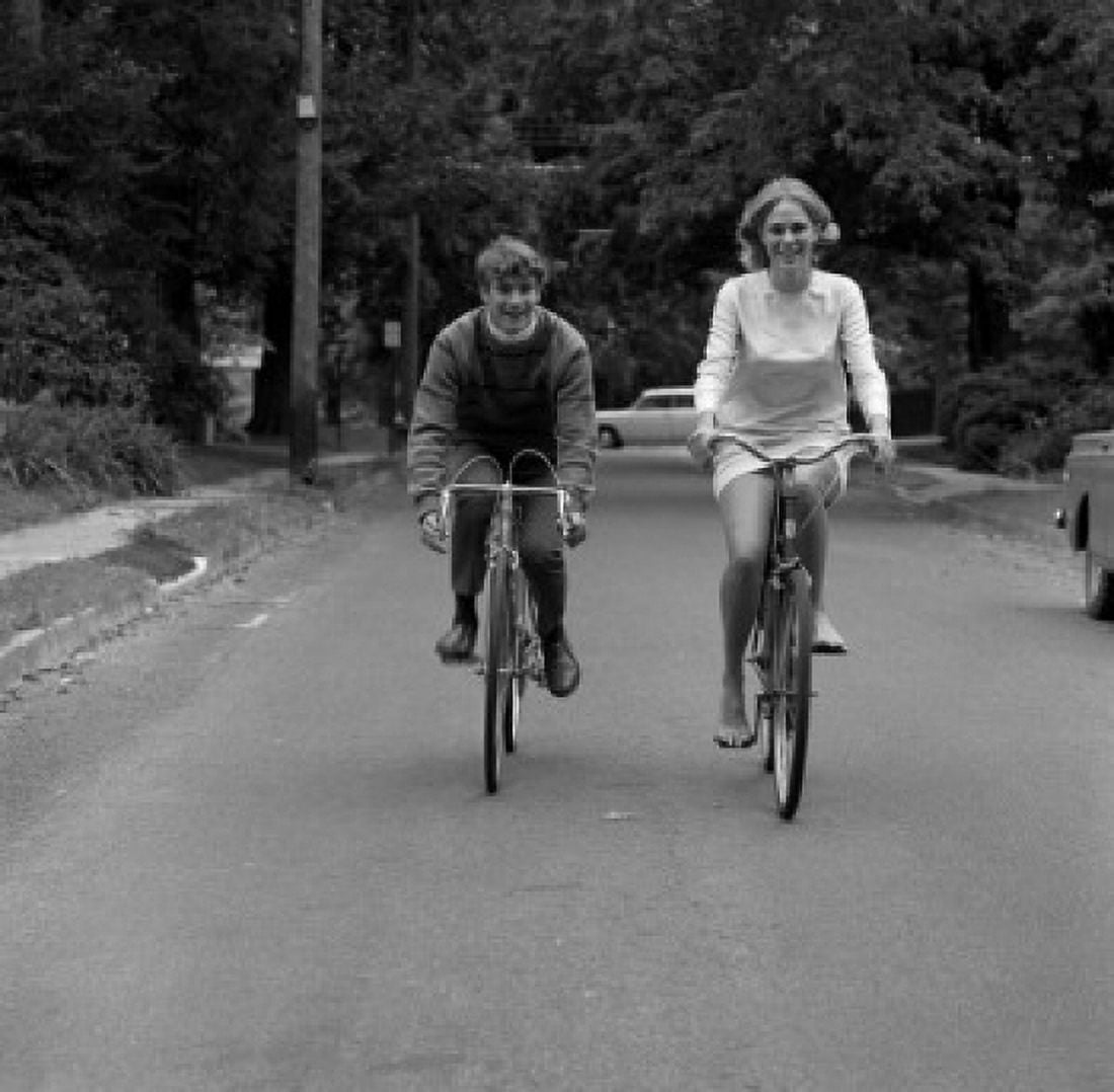 Young people riding bikes Canvas Art - (18 x 24)