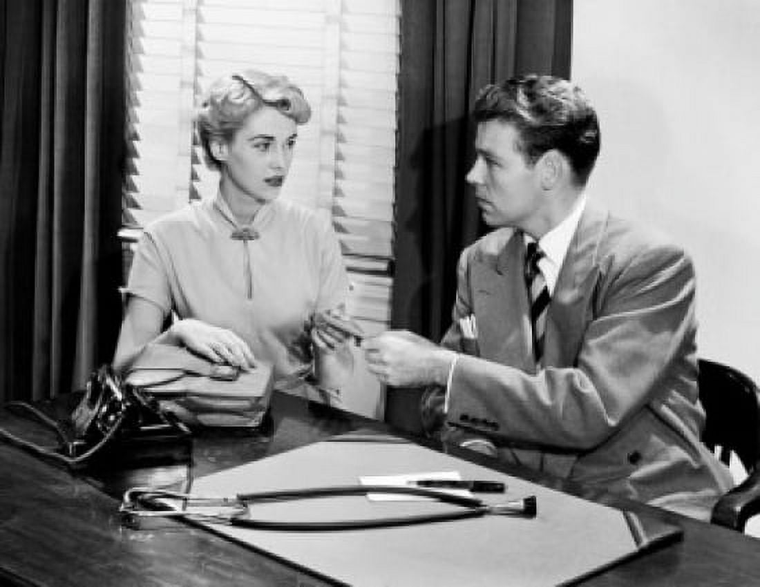 Young woman and young man at doctors office Canvas Art - (18 x 24)