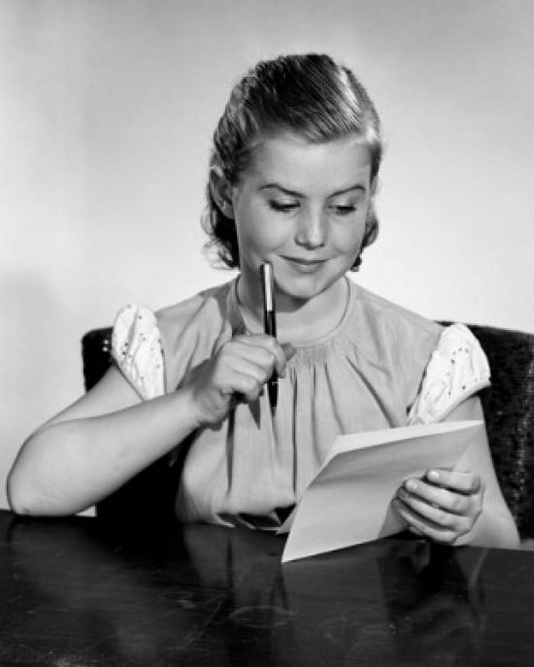 Young woman at table writing letter Canvas Art - (18 x 24)