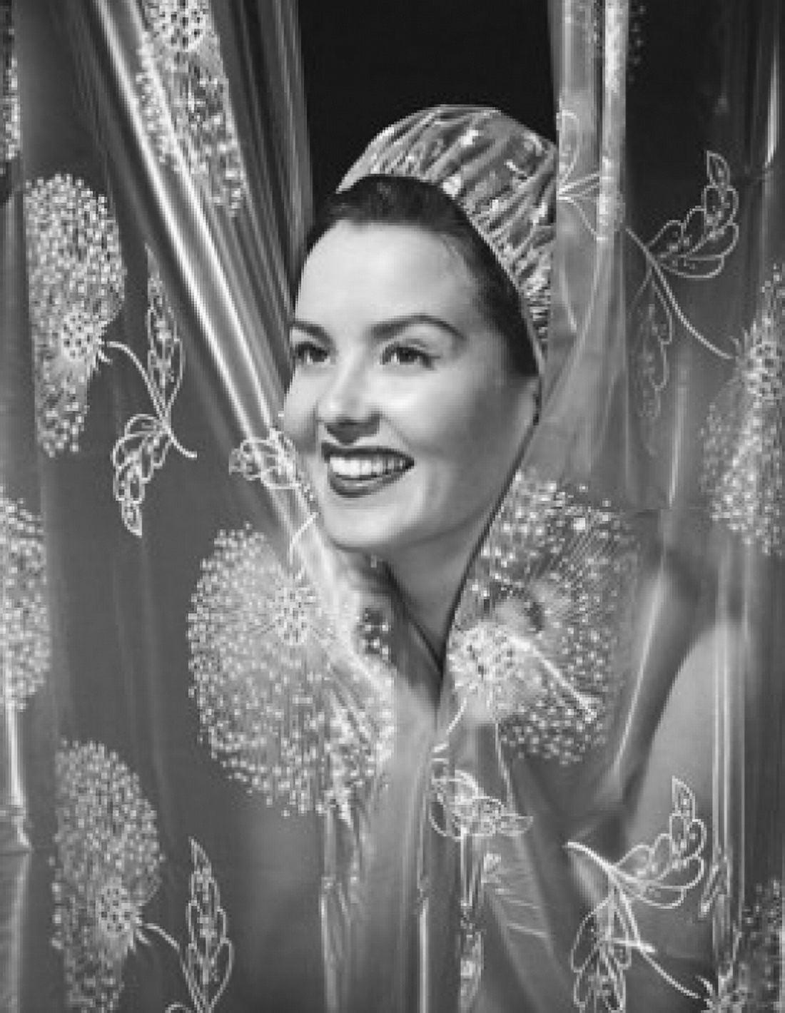 Young woman covering herself with shower curtains in a bathroom Canvas Art - (18 x 24)