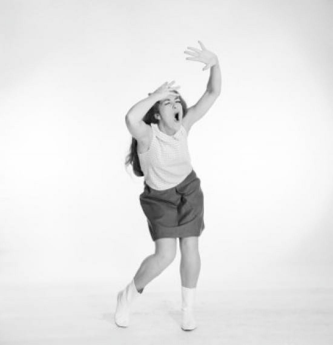 Young woman dancing and singing Canvas Art - (18 x 24)