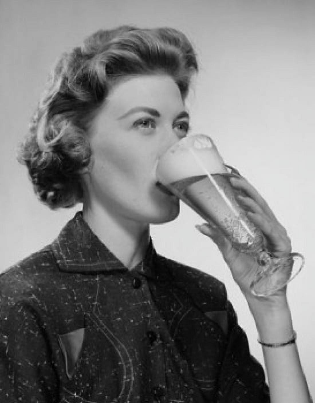 Young woman drinking beer Canvas Art - (18 x 24)