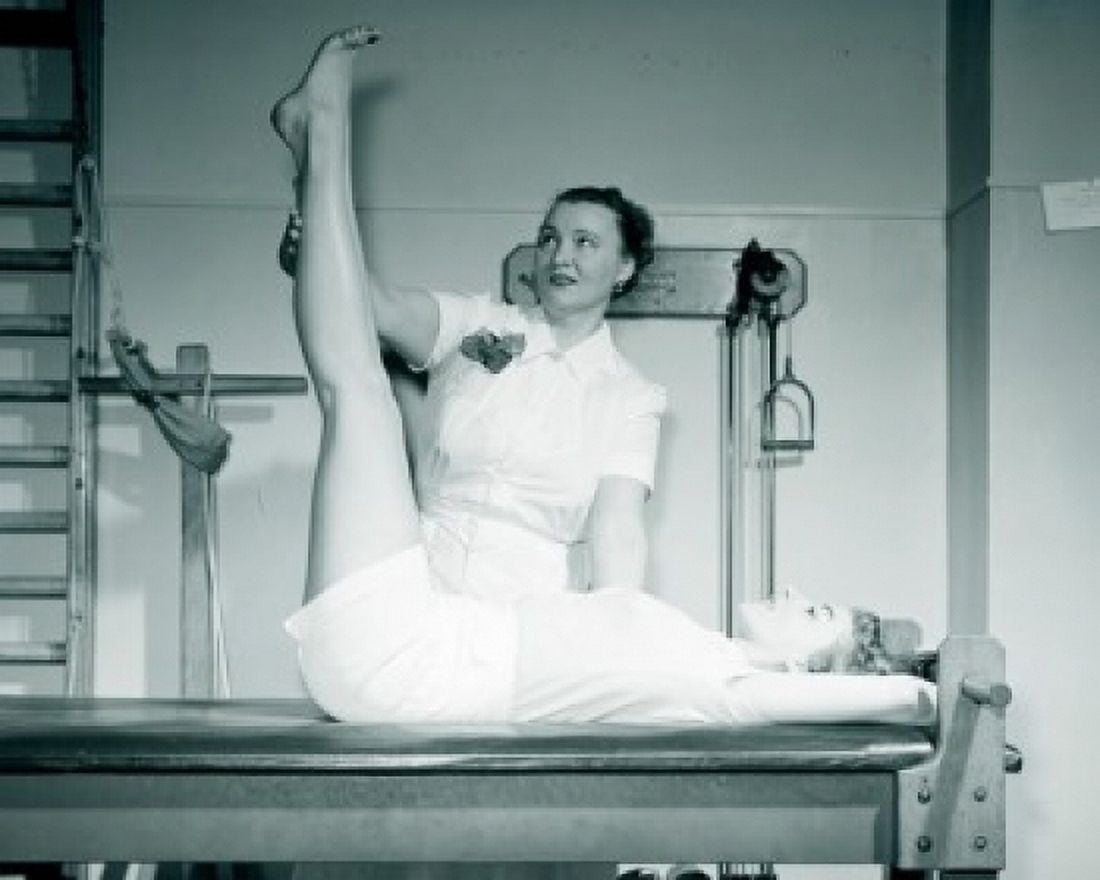 Young woman exercising with training instructor in gym Canvas Art - (24 x 36)