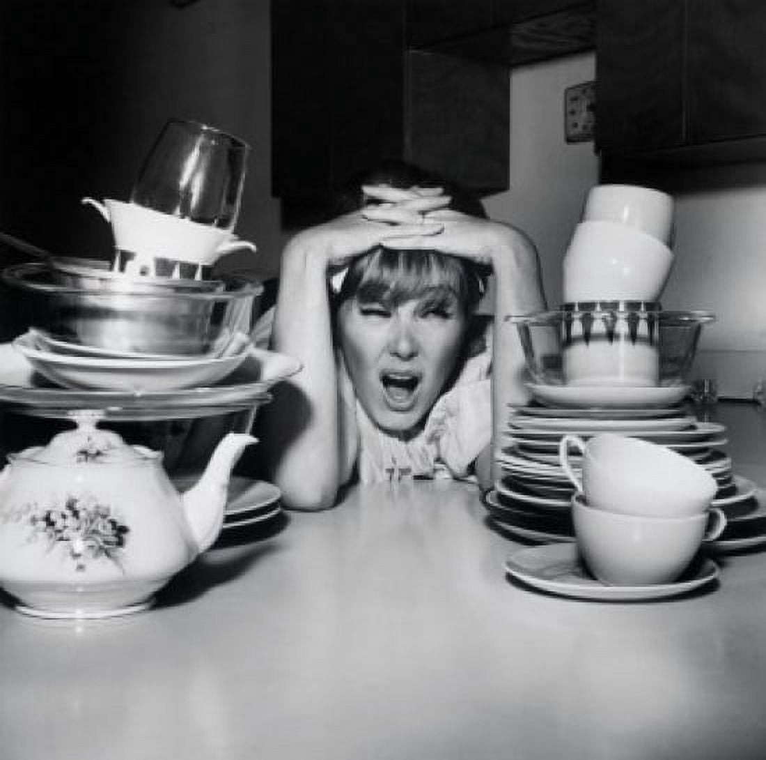 Young woman frustrated by stacks of dishes Canvas Art -  (18 x 24)