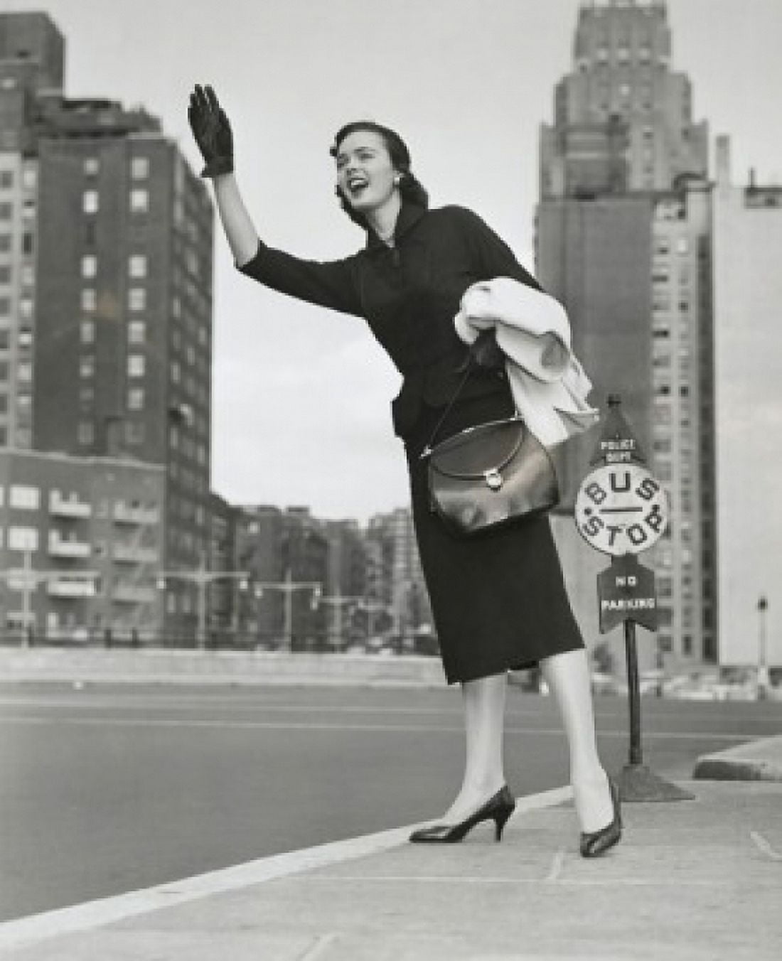 Young woman hailing vehicle Canvas Art - (18 x 24)
