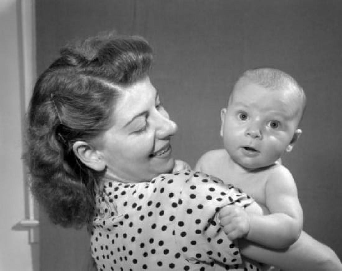 Young woman holding baby Canvas Art - (18 x 24)
