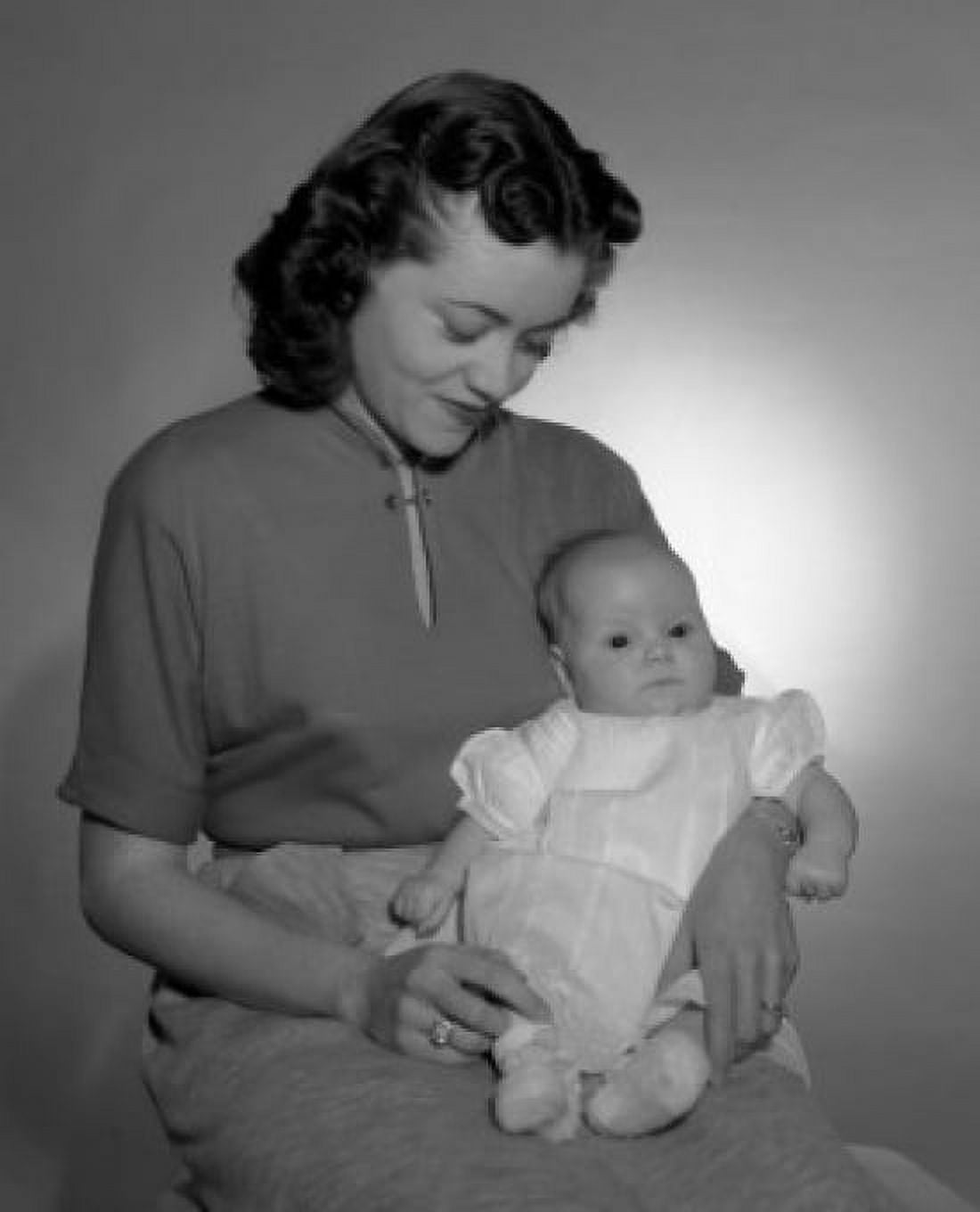 Young woman holding baby girl Canvas Art - (18 x 24)