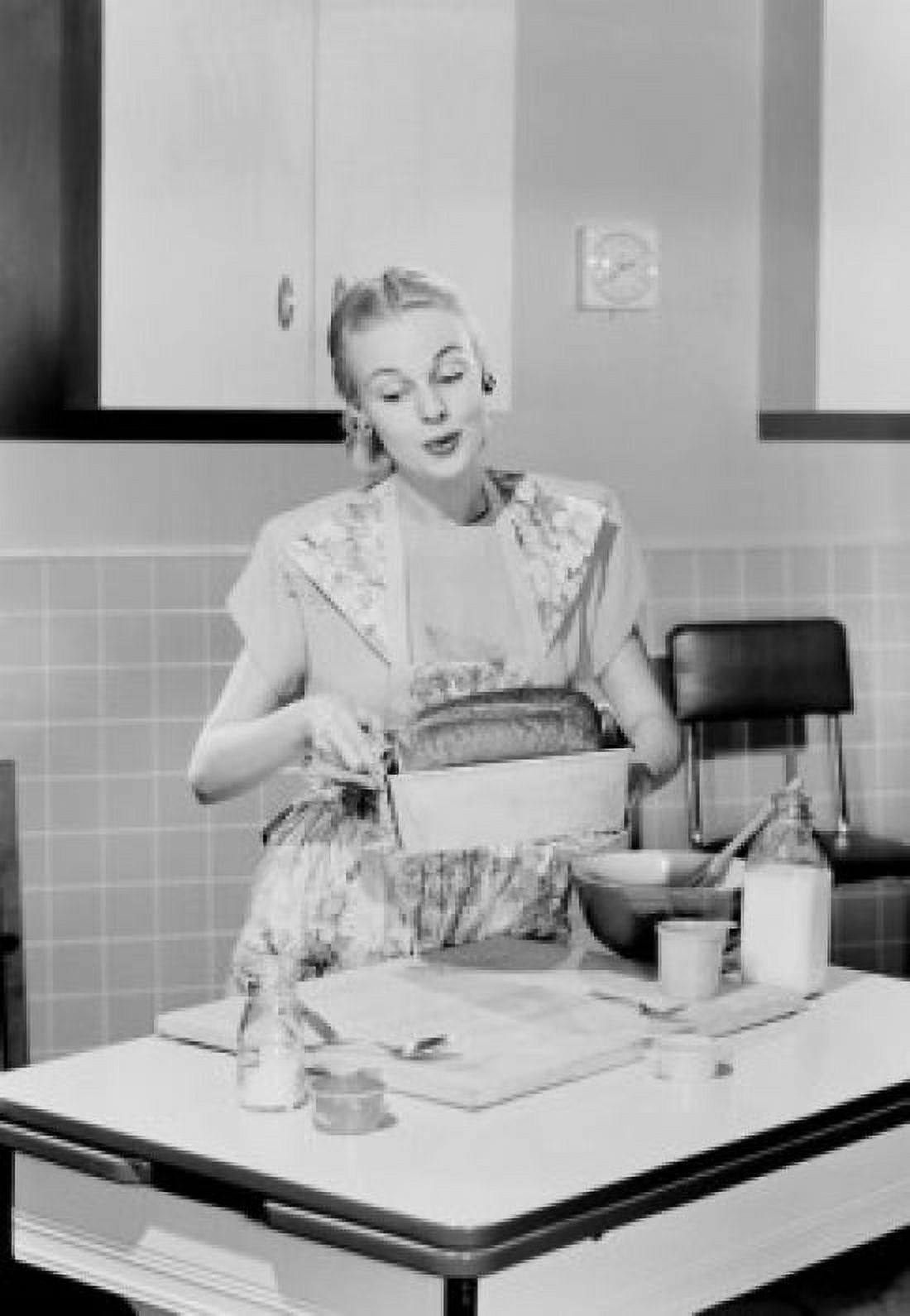 Young woman holding fresh home-baked bread Canvas Art - (24 x 36)