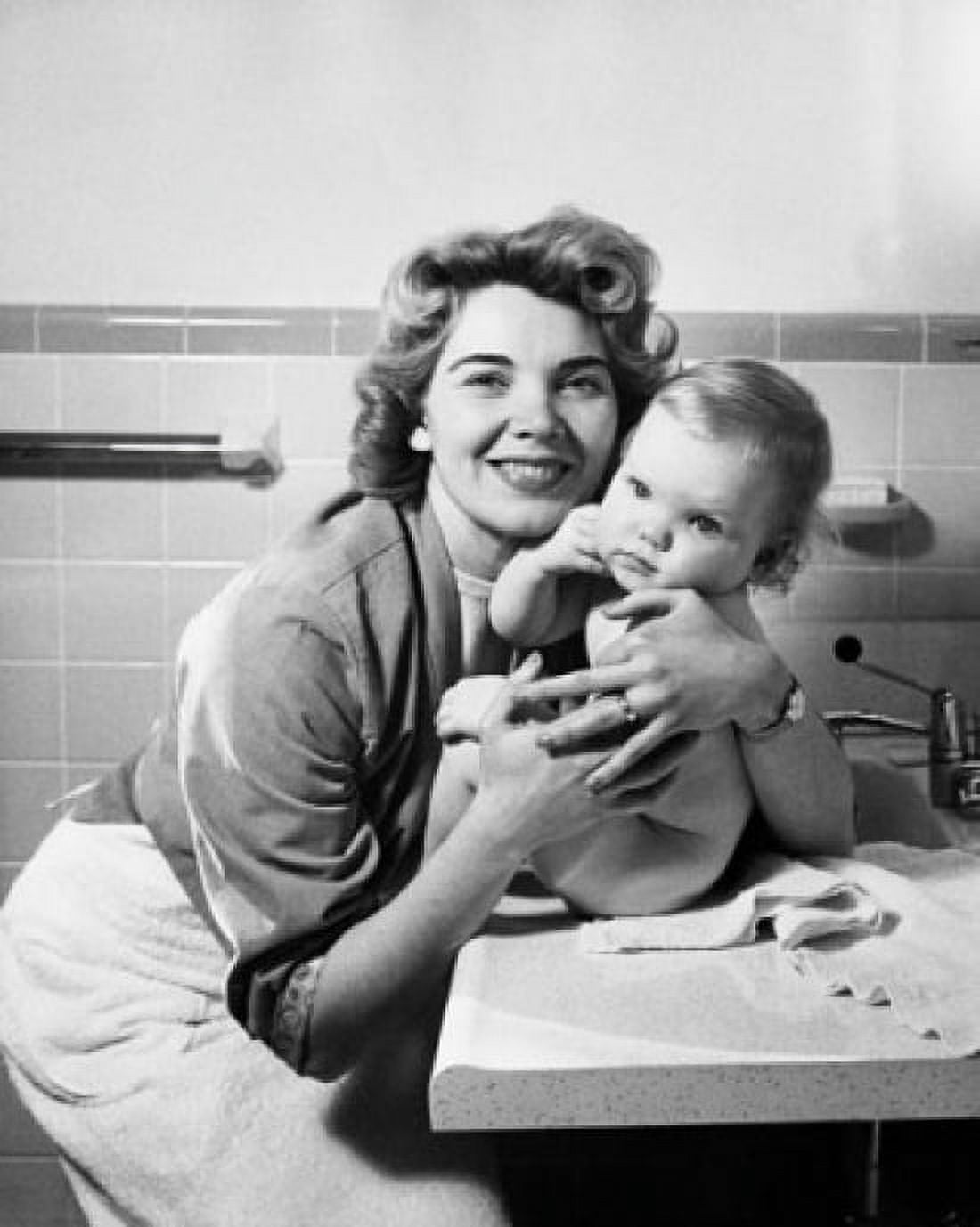 Young woman hugging her baby and smiling Canvas Art - (18 x 24)