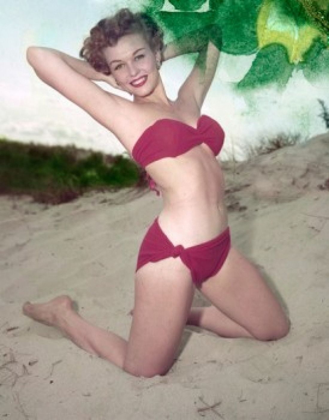 Young woman in bikini posing on beach Canvas Art - (24 x 36)