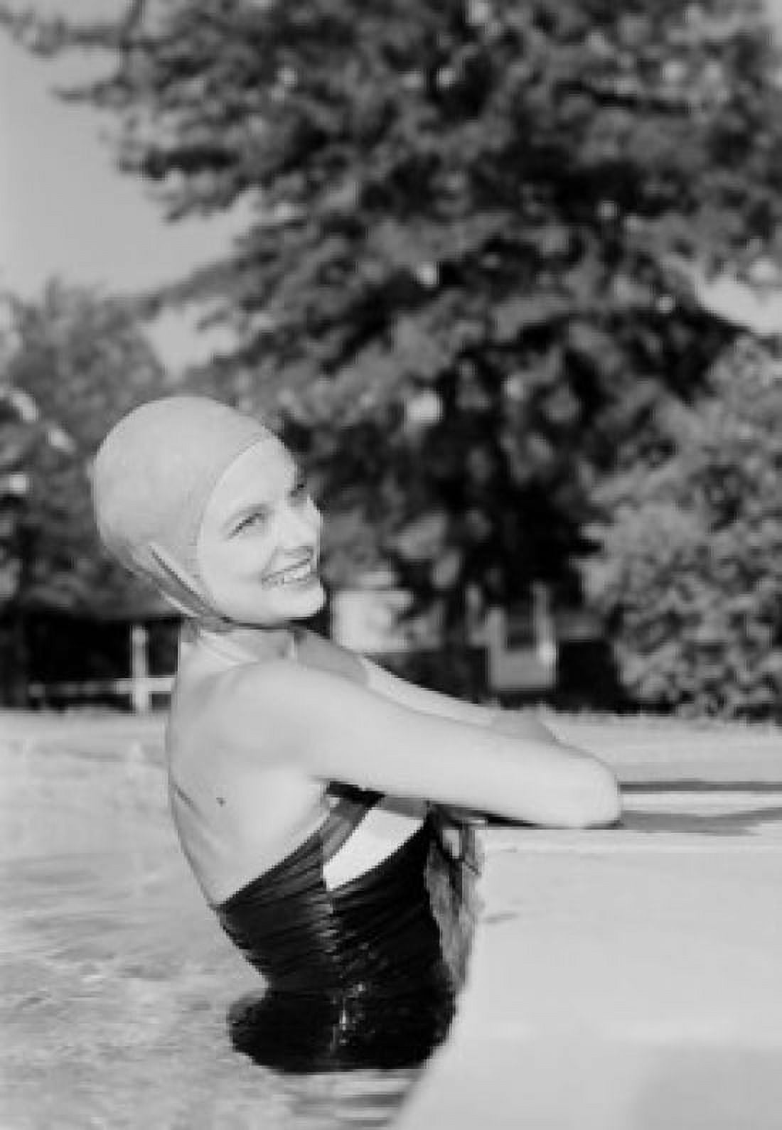 Young woman in outdoor swimming pool smiling Canvas Art - (24 x 36)