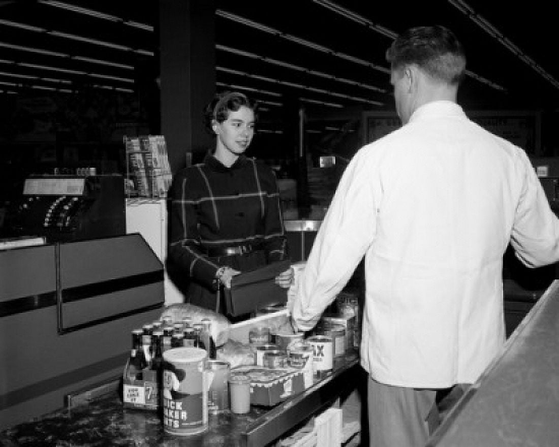 Young woman in supermarket Canvas Art - (24 x 36)
