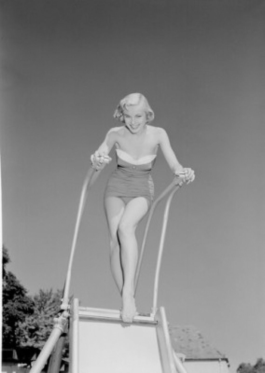 Young woman in swimwear on slide Canvas Art - (18 x 24)