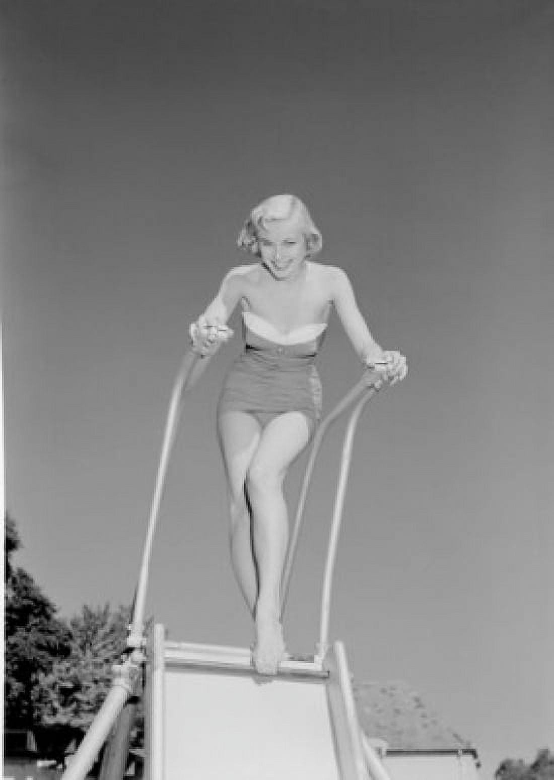 Young woman in swimwear on slide Canvas Art - (24 x 36)
