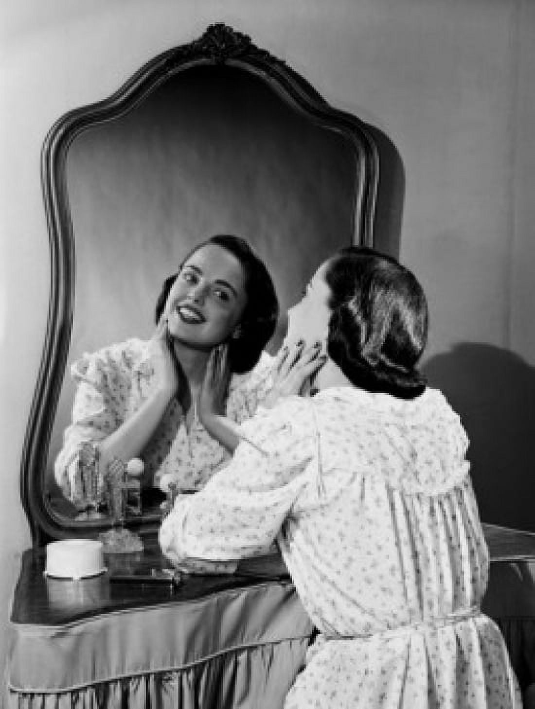 Young woman looking at mirror Canvas Art - (24 x 36)