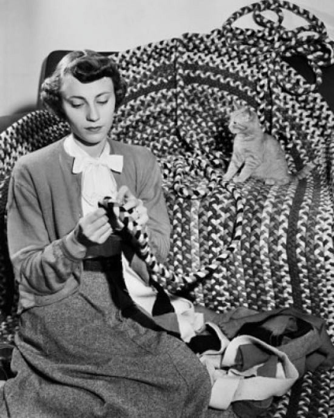 Young woman making a rag rug Canvas Art - (18 x 24)