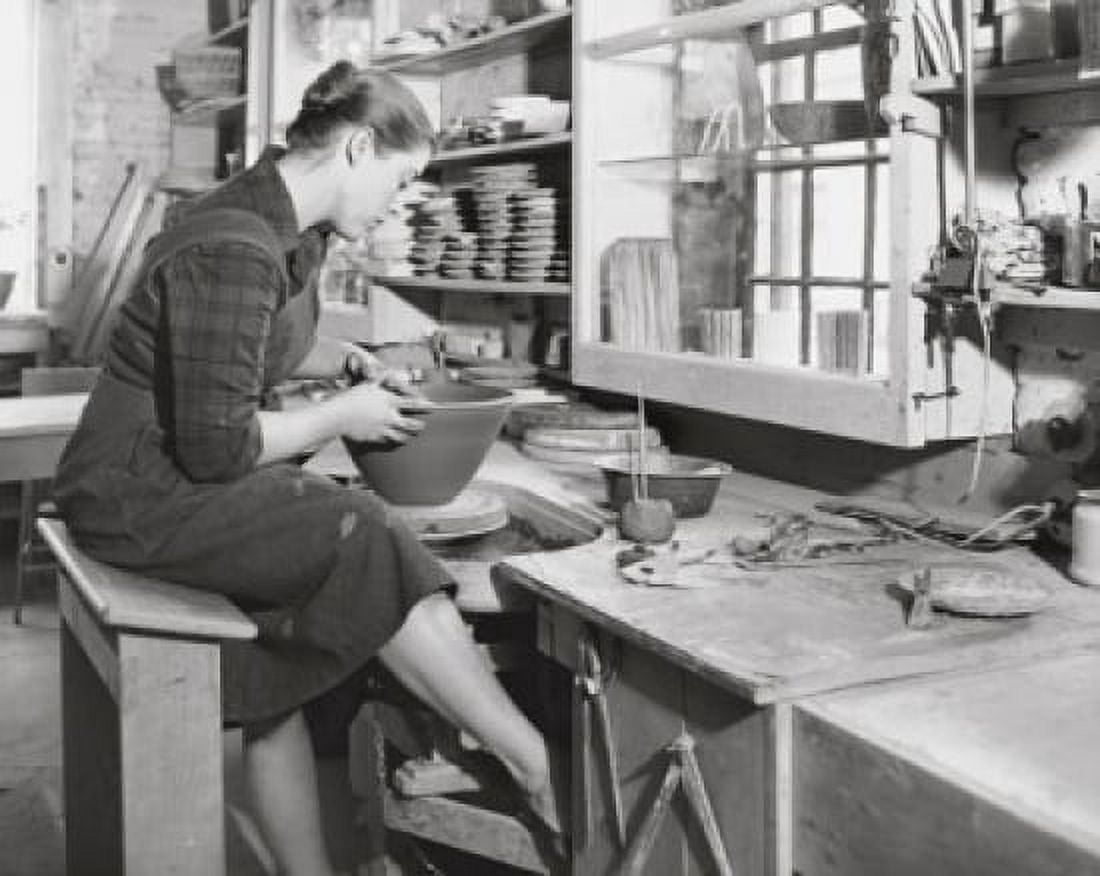 Young woman making pottery on a pottery wheel Canvas Art - (18 x 24)