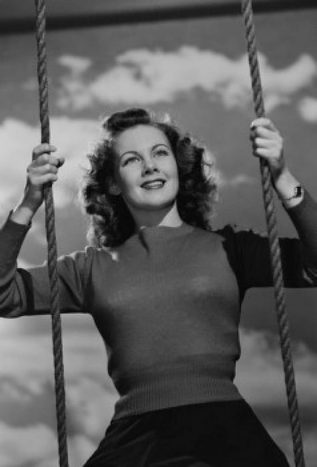 Young woman on swing Canvas Art - (24 x 36)