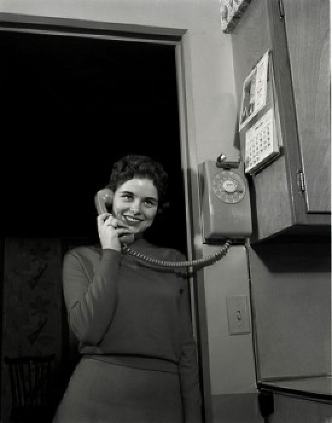 Young woman on the phone low angle view Canvas Art - (24 x 36)