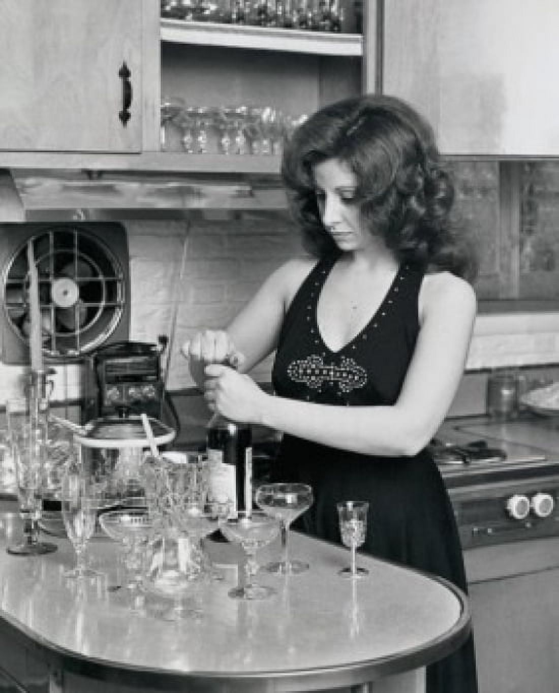 Young woman opening a wine bottle Canvas Art - (18 x 24)