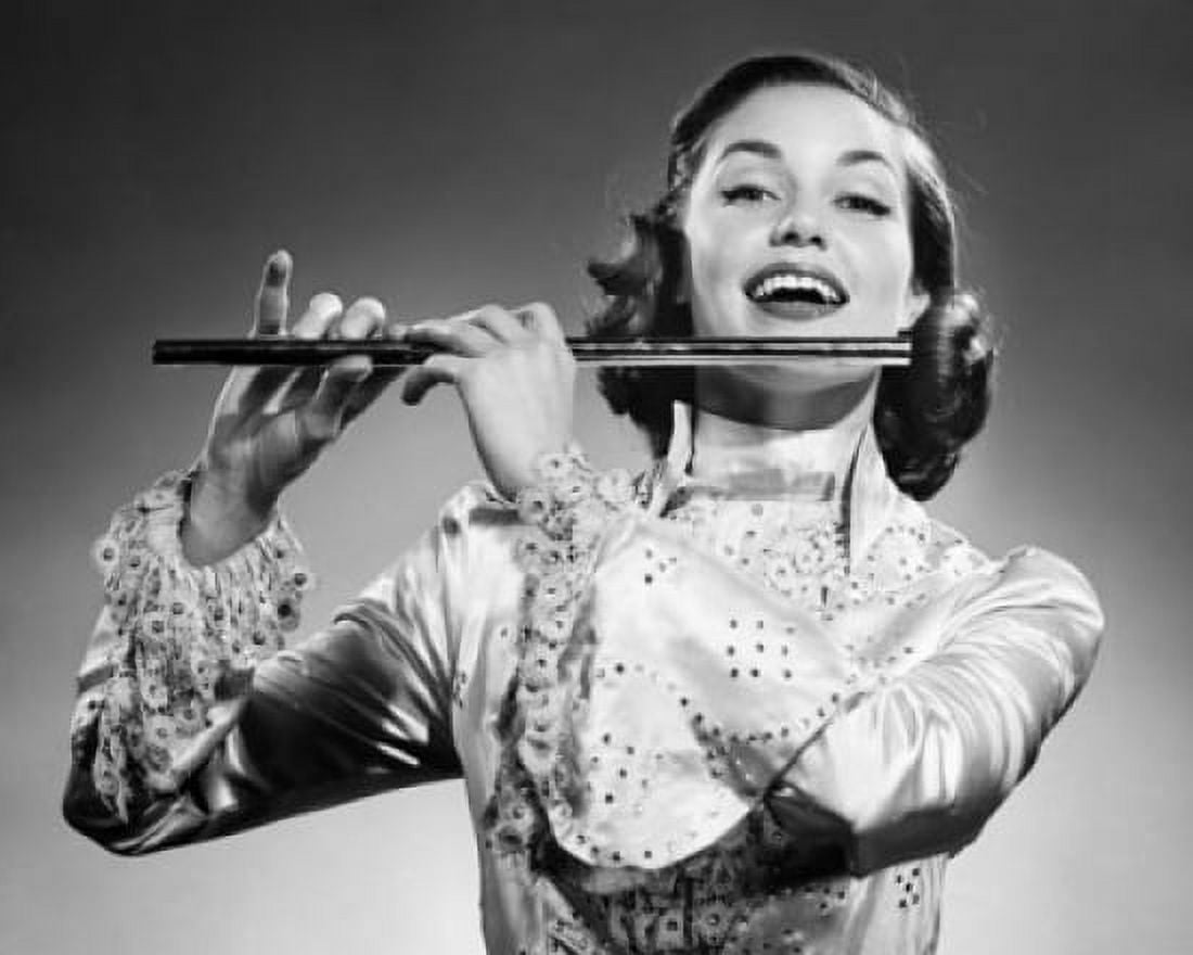 Young woman playing a flute and smiling Canvas Art - (18 x 24)
