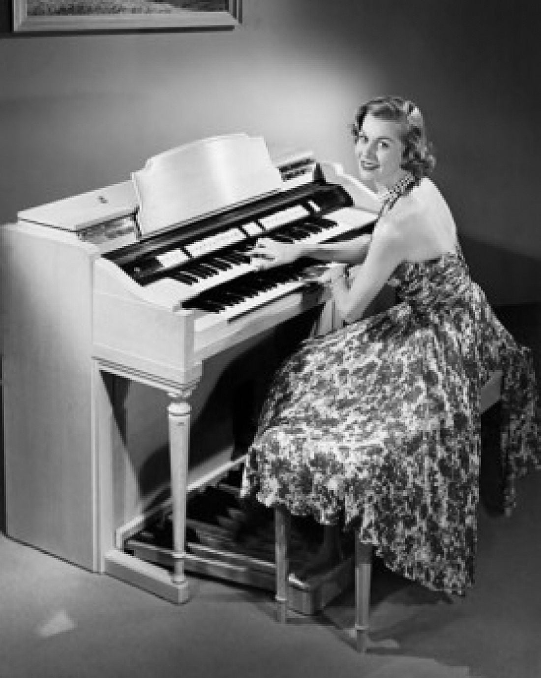 Young woman playing a piano Canvas Art - (24 x 36)