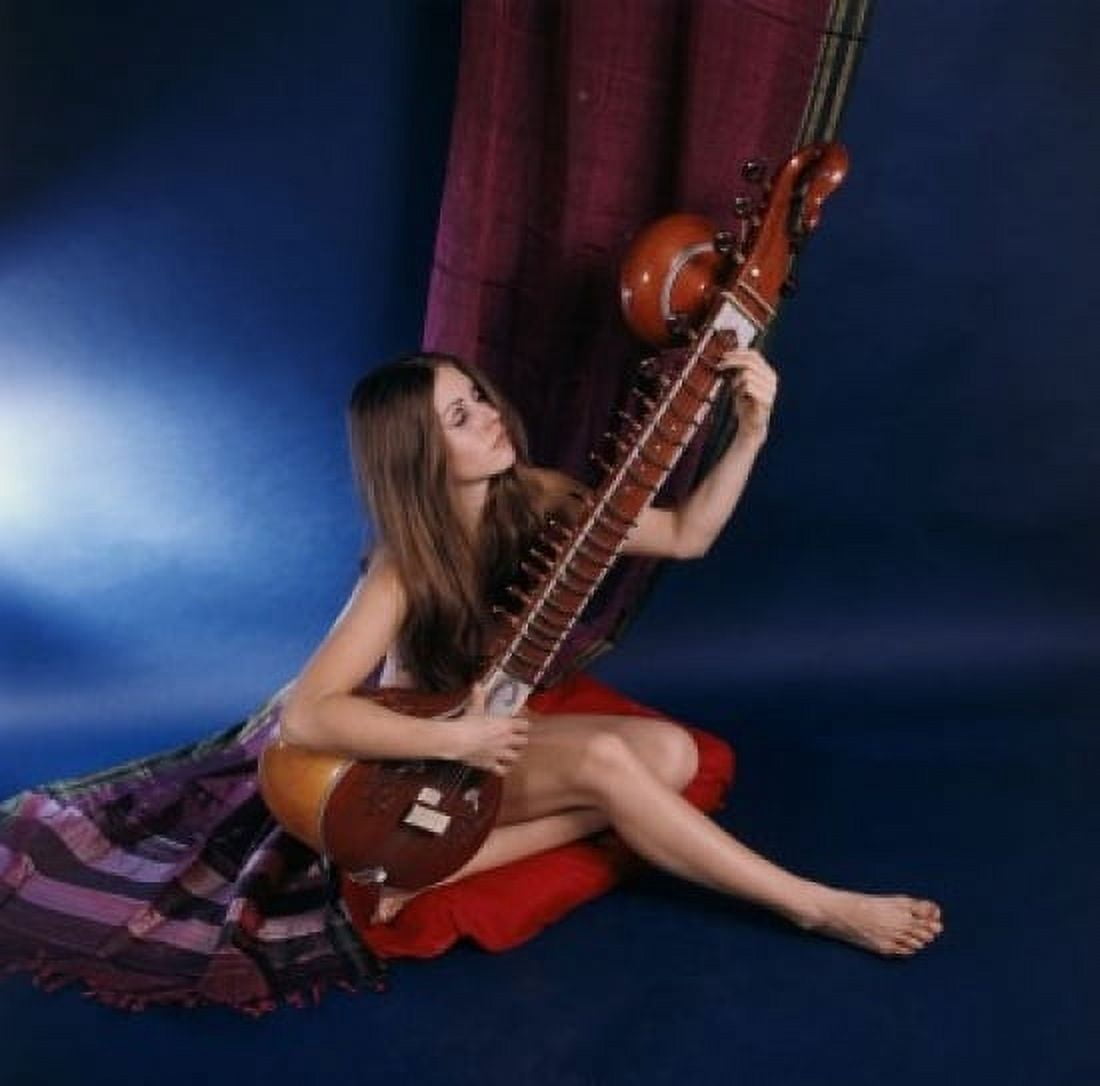 Young woman playing a veena Canvas Art - (24 x 36)