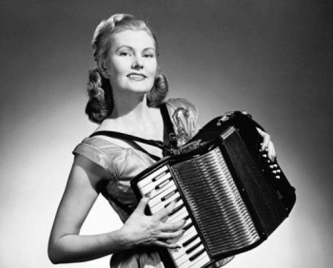 Young woman playing an accordion Canvas Art - (24 x 36)