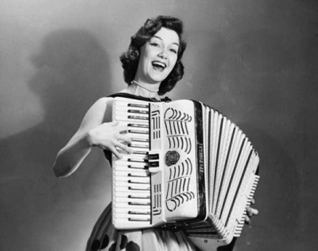 Young woman playing an accordion Canvas Art - (24 x 36)