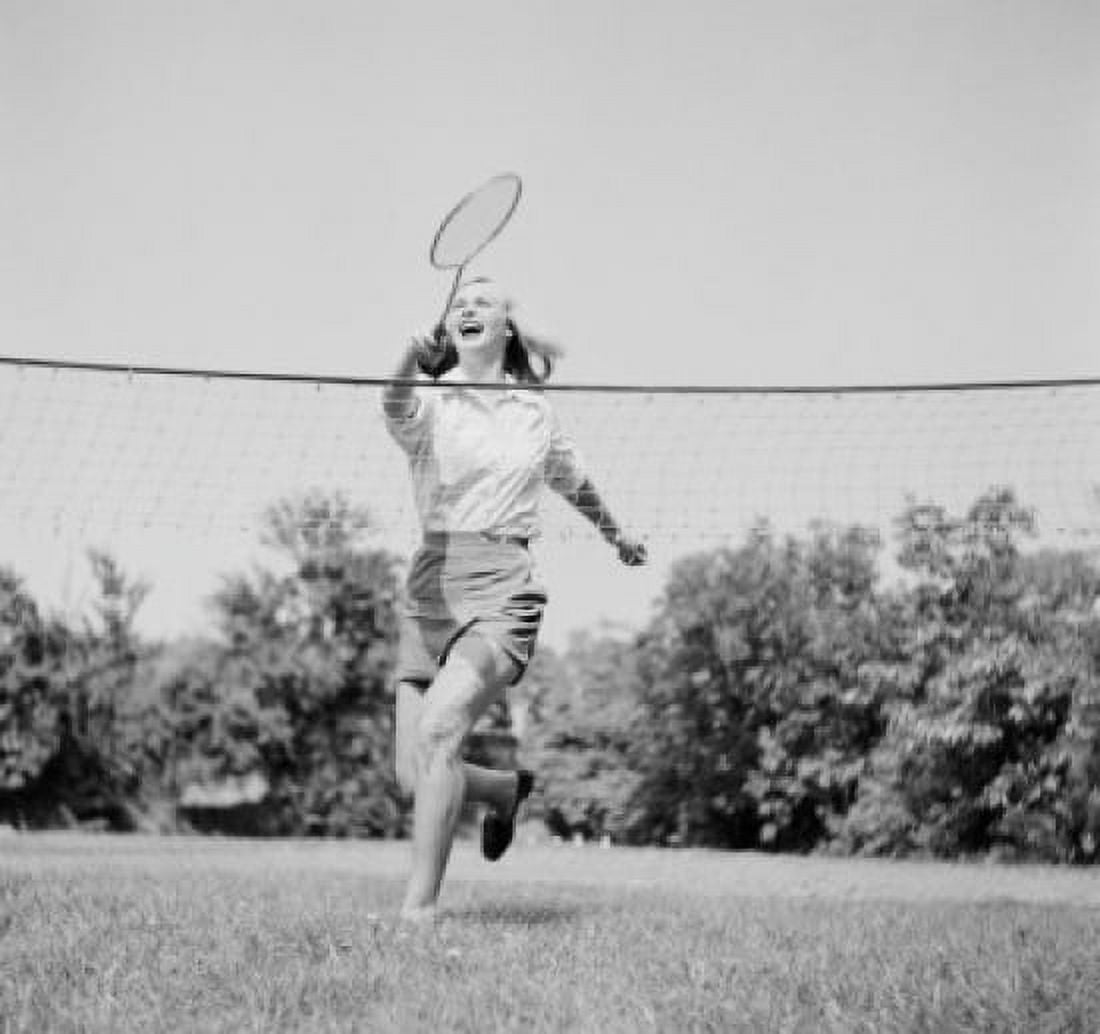 Young woman playing badminton Canvas Art - (24 x 36)