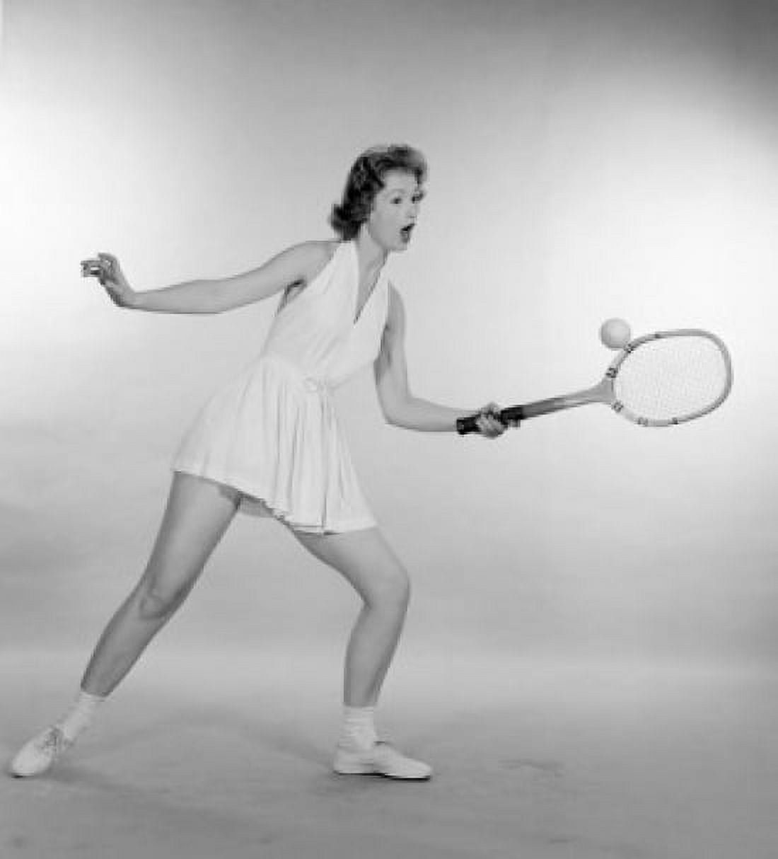 Young woman playing tennis Canvas Art - (18 x 24)