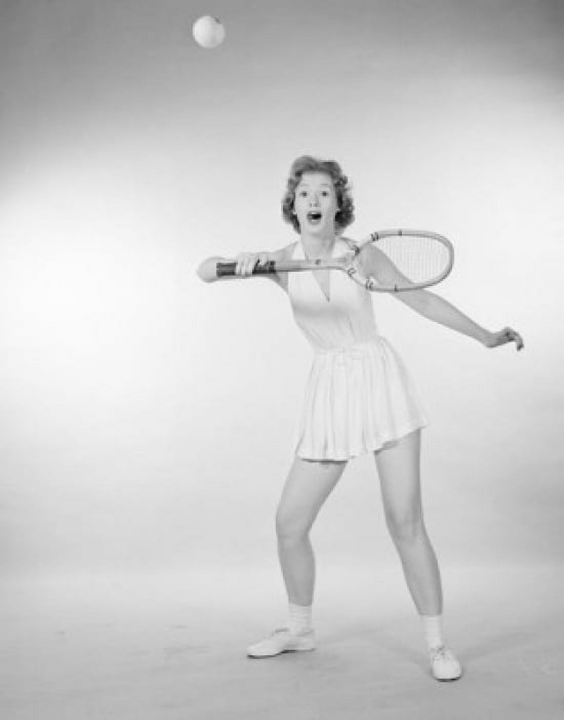 Young woman playing tennis Canvas Art - (24 x 36)