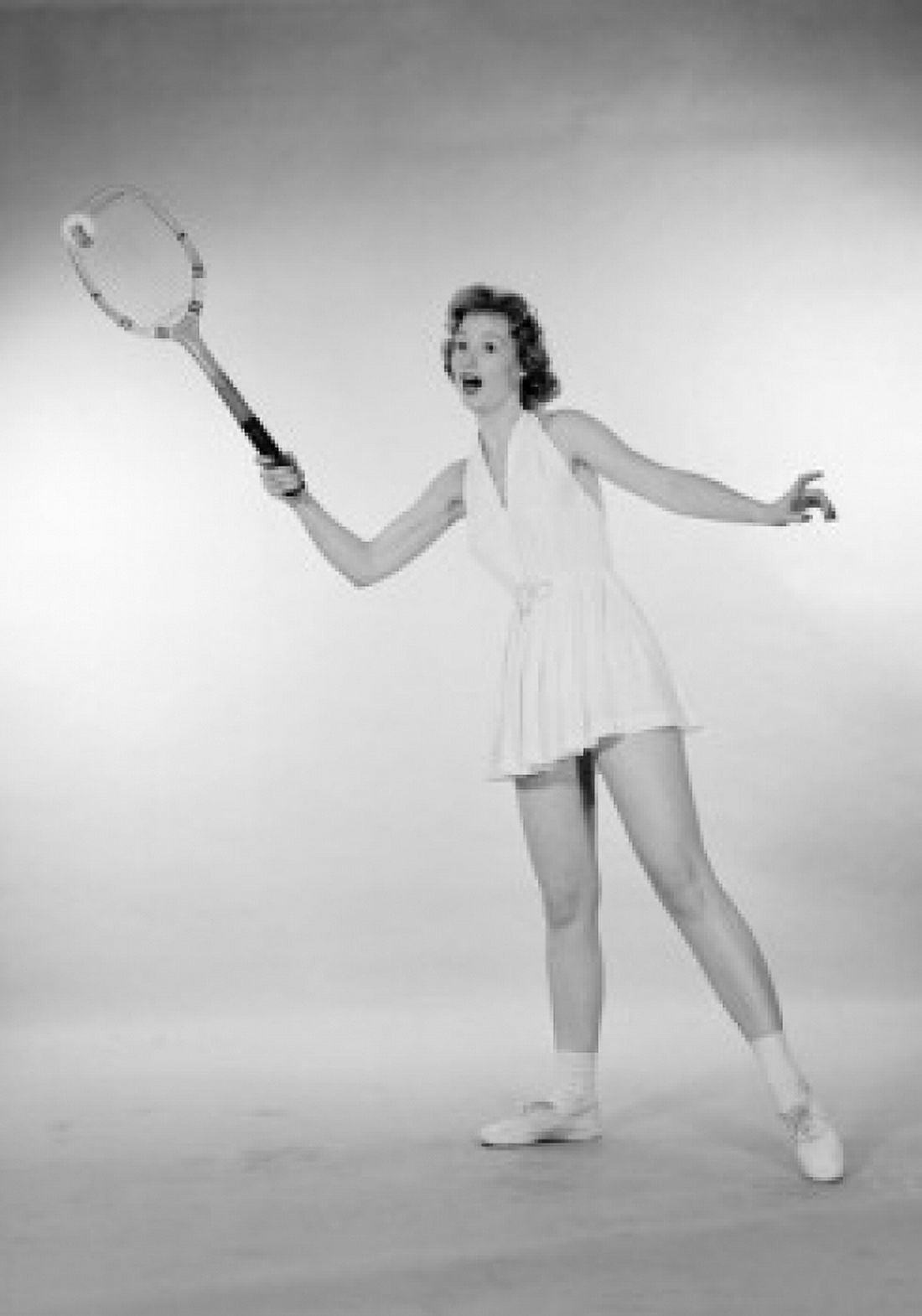 Young woman playing tennis Canvas Art - (24 x 36)
