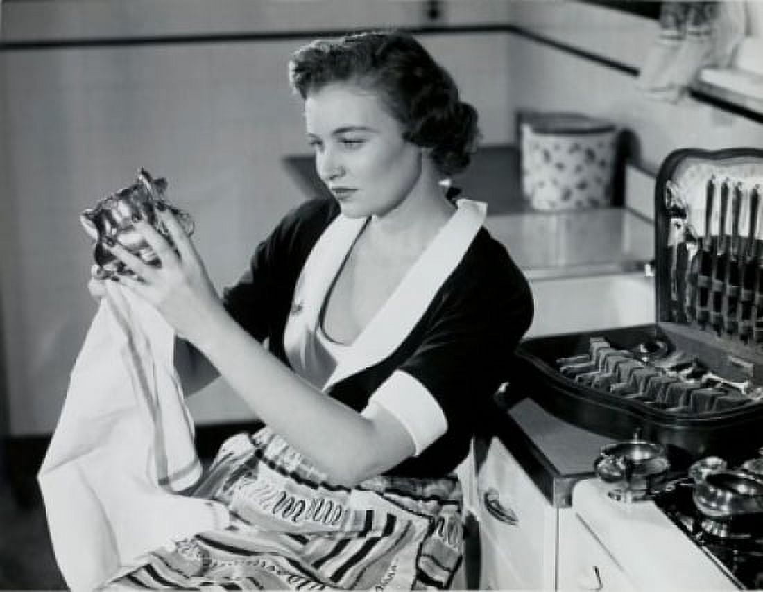 Young woman polishing silver Canvas Art - (18 x 24)
