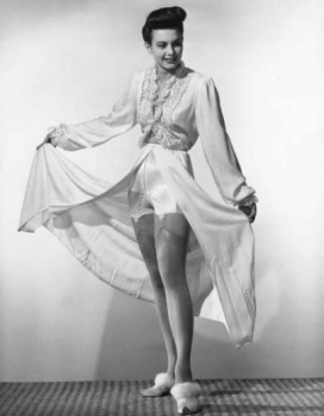Young woman posing with holding her robe Canvas Art - (24 x 36)