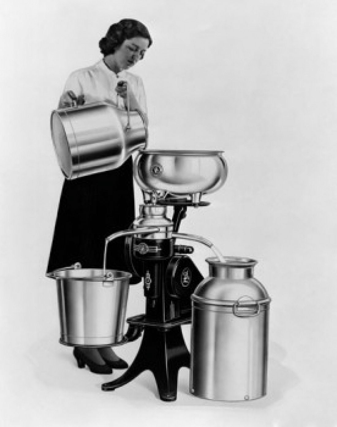 Young woman pouring milk into a cream separator De Laval cream separator Canvas Art - (18 x 24)