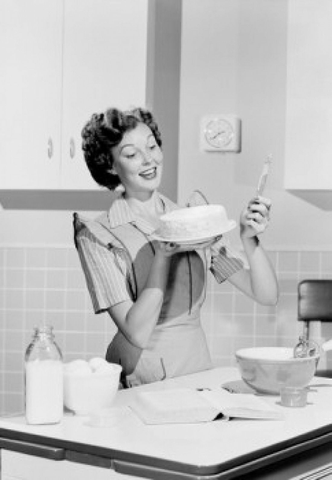 Young woman preparing cake in domestic kitchen Canvas Art - (18 x 24)
