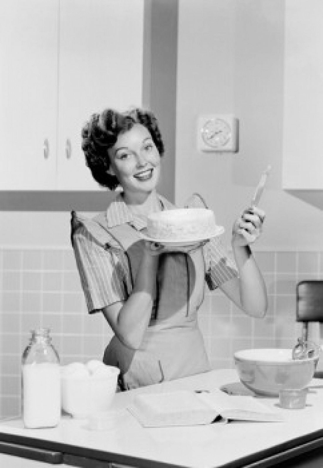Young woman preparing cake in domestic kitchen Canvas Art - (18 x 24)