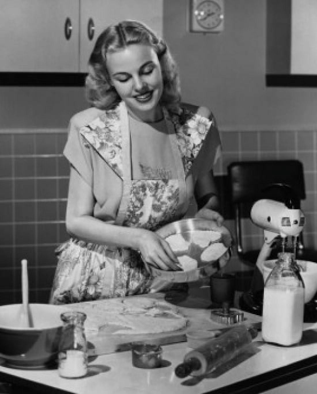 Young woman preparing cookies in the kitchen Canvas Art - (18 x 24)