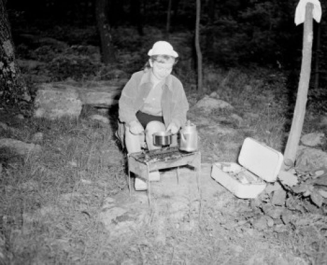 Young woman preparing food and drink on barbecue grill Canvas Art - (18 x 24)