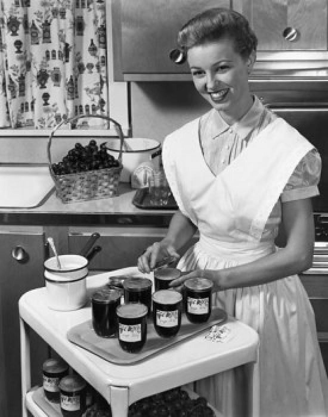 Young woman preparing jam in a kitchen Canvas Art - (24 x 36)