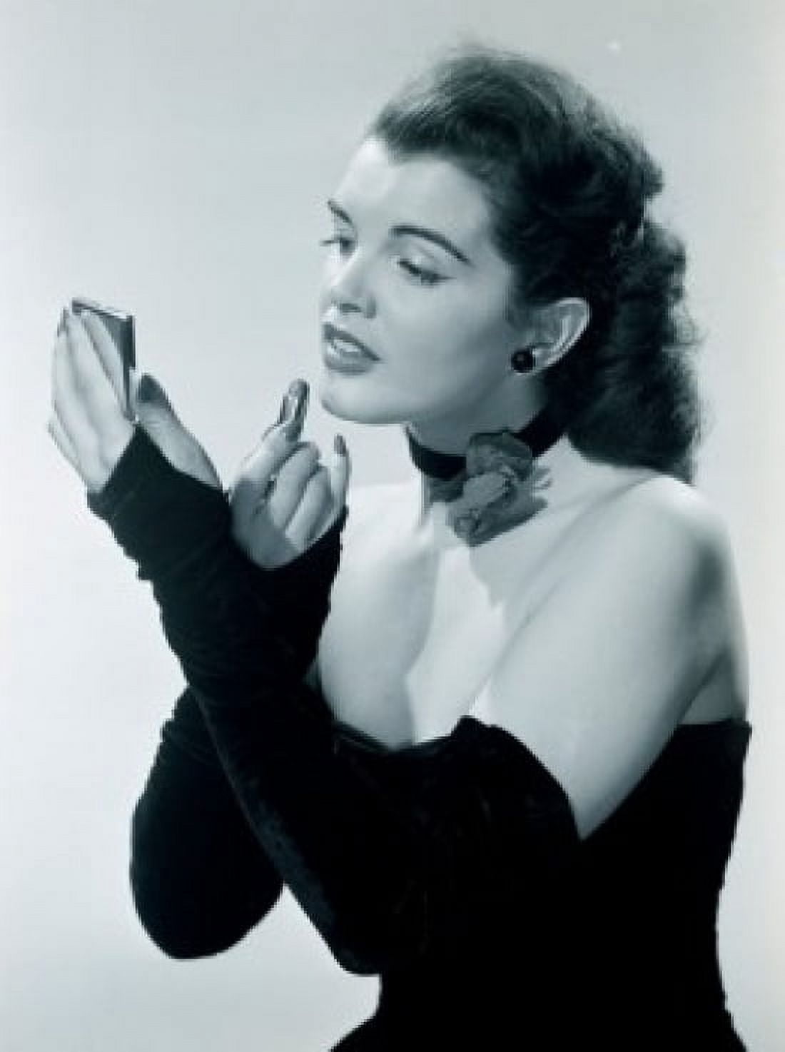 Young woman putting on make-up Canvas Art - (24 x 36)