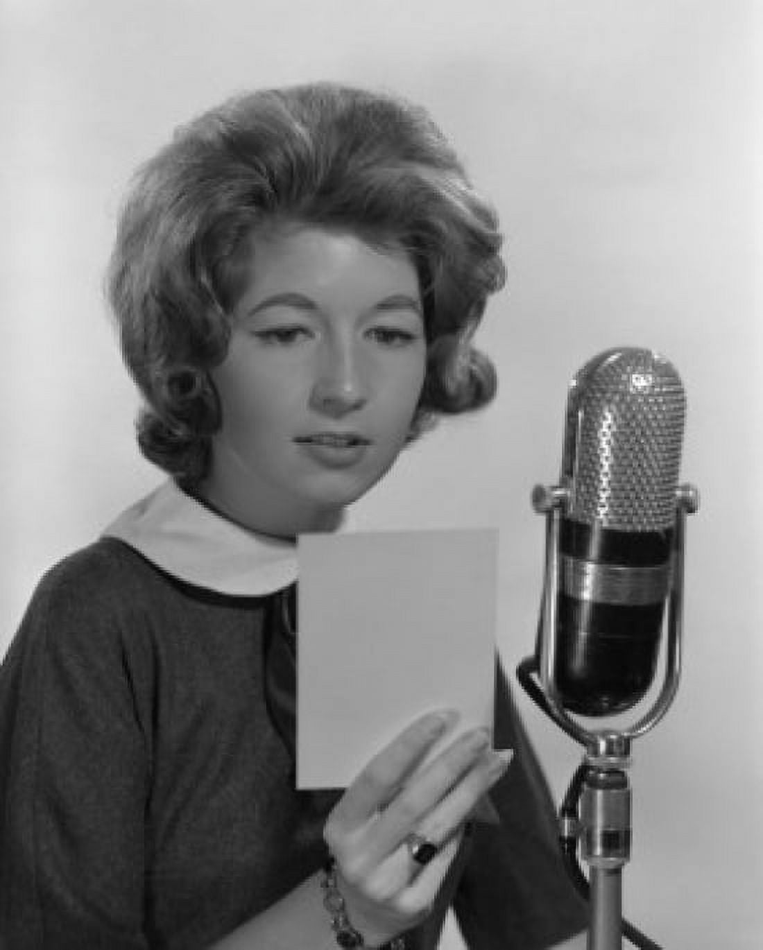 Young woman reading into microphone Canvas Art - (24 x 36)